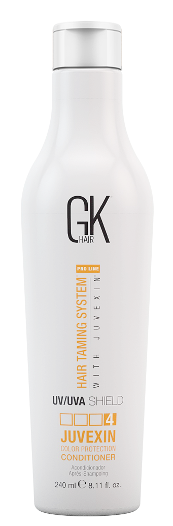 En vit flaska med GK Hair Juvexin balsam, med etiketter som visar UV/UVA-skydd och näring till håret.
