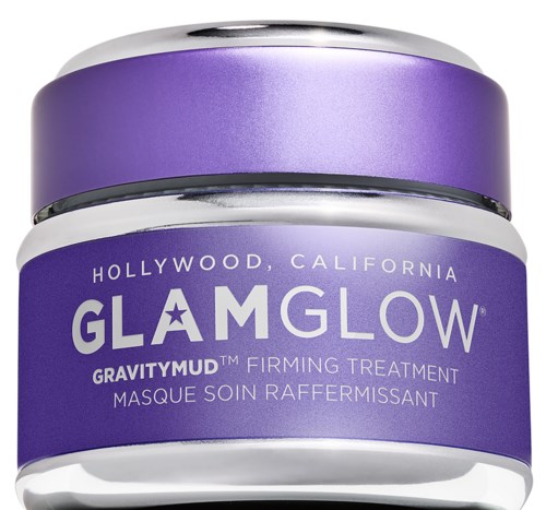 En lilla krukke med GlamGlow GravityMud fasthedsbehandling med sølvdetaljer, mærket med produkt- og mærkenavn.