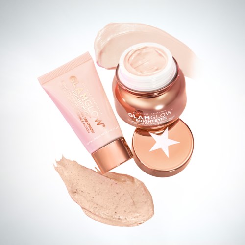 A skincare set with a pink tube and a jar of cream, both labeled GlamGlow. The products are open and ready to use.