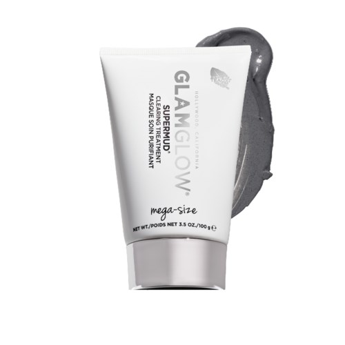 En vit tub med GlamGlow Supermud-mask med svart lera som sprider ut sig.