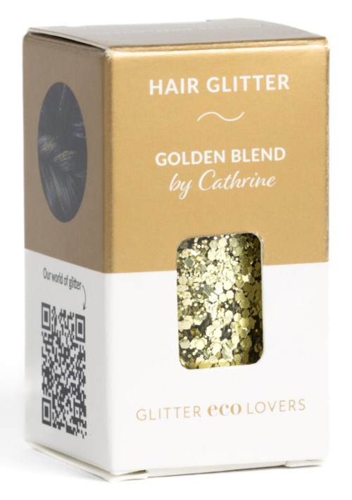 Złote i białe pudełko z napisem 'Hair Glitter' i okienkiem revealing złoty brokat. Mówi 'Golden Blend by Catherine'.
