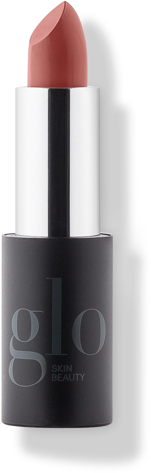 A lipstick with a pink shade in a black and white tube.