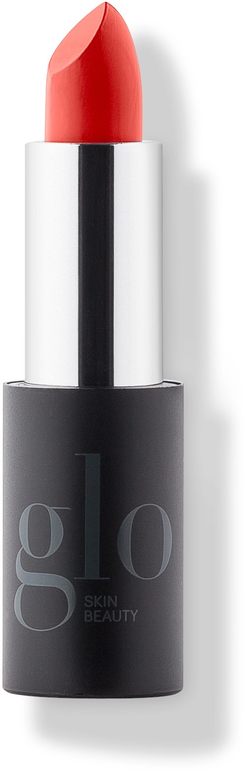 A lipstick tube with a red lipstick inside and a black and white casing showing the brand 'go skin beauty.'
