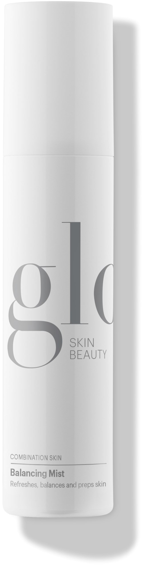 En vit flaska med grå text, märkt 'glo Skin Beauty Balancing Mist' för hudvård.