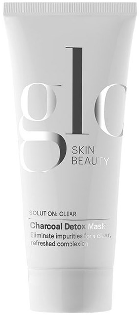 En hvit tube med Charcoal Detox Mask fra Skin Beauty med svart og grå tekst.