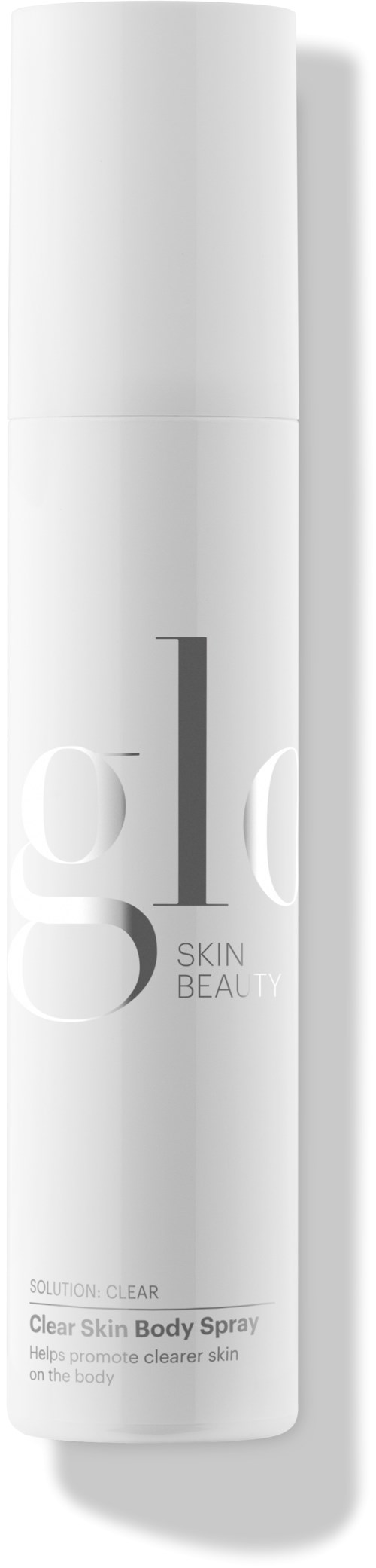 En vit flaska med spraymunstycke, märkt 'Clear Skin Body Spray' för hudvård.