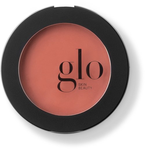 En rund blush-krukke med sort kant, mærket 'glo SKIN BEAUTY' i sorte bogstaver.