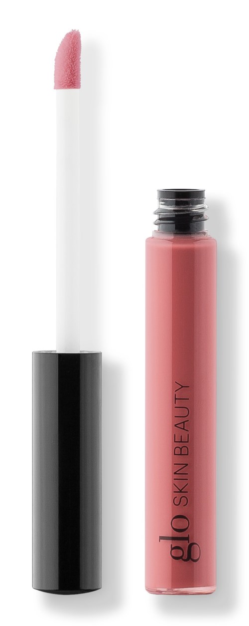 Läppglansbehållare med rosa gloss på en vit applikator.