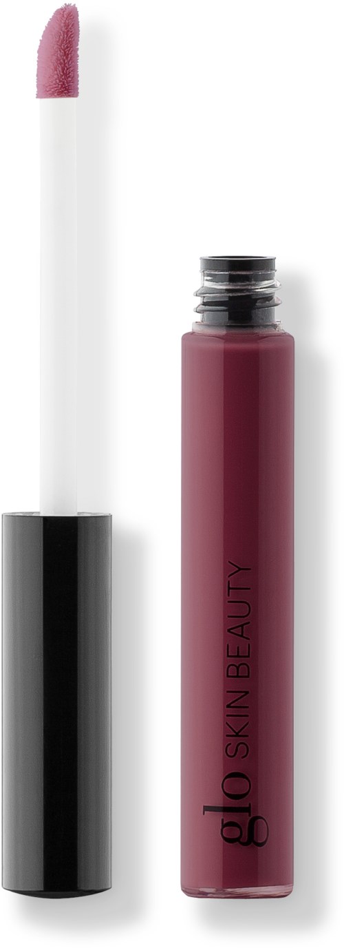 En läppglansrör med borste, visar en ljusrosa färg och svart lock, och en cylindrisk behållare med texten 'glo Skin Beauty'.