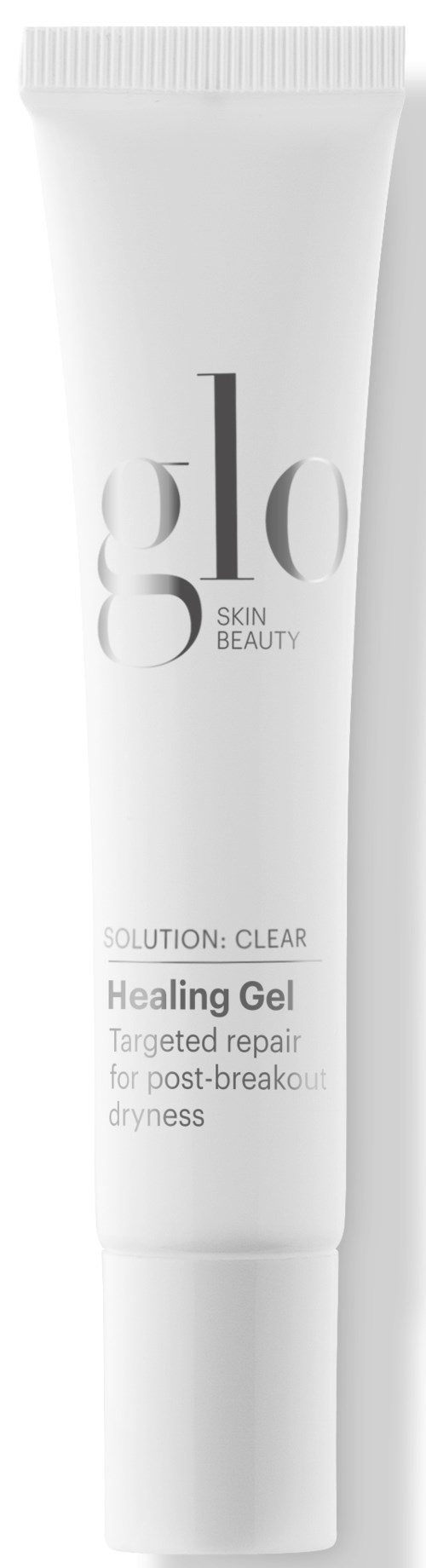 Hvid tube med helende gel til at reparere tør hud efter sprækker, mærket 'glo' og 'SKIN BEAUTY'.