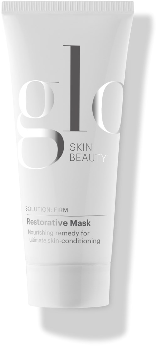 En hvit tube med hudpleieproduksjon med grå og svart tekst, merket som en restoratív maske for hudens tilstand.