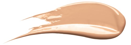 En stripe av beige foundation spredd på svart bakgrunn.