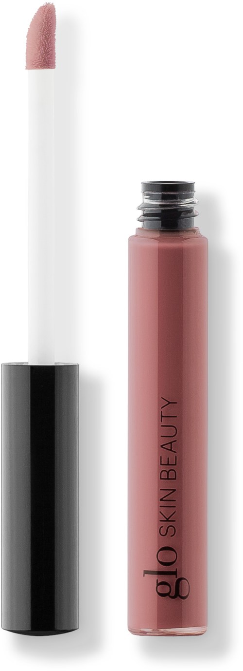 En läppglans med en vit applikator och en rosa tub märkt "glow SKIN BEAUTY."