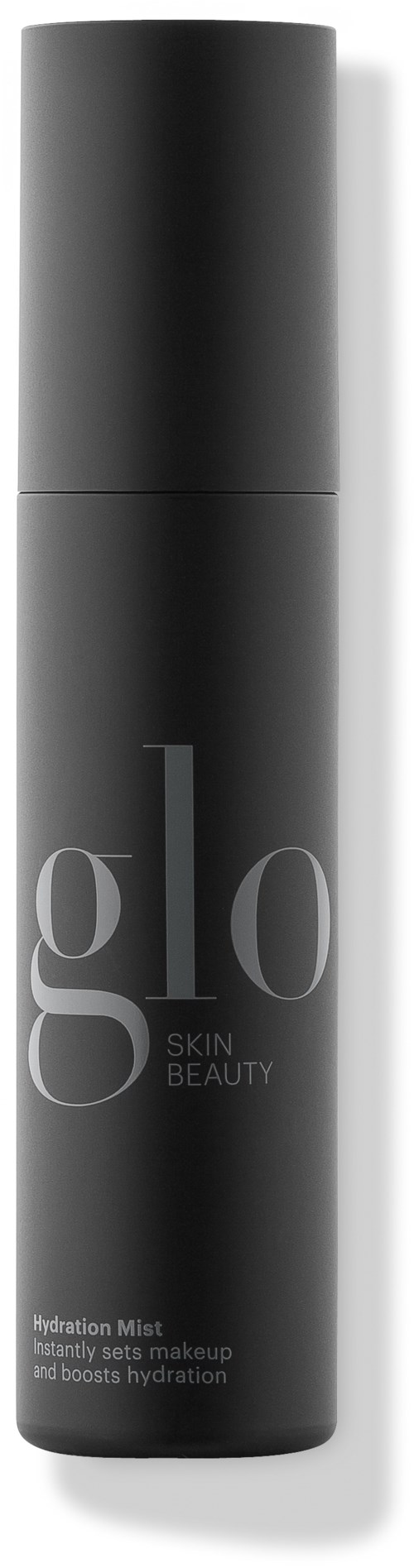 En lang, elegant svart og grå flaske merket 'glo Skin Beauty Hydration Mist.'