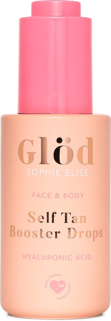 En rosa og beige flaske merket Glød, Sophie Elise, for selvbruningsdråper til ansikt og kropp med hyaluronsyre.