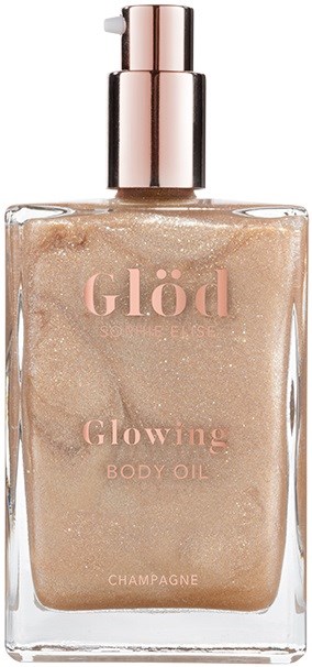 Läpinäkyvä pullo, kiiltävä vaaleanpunainen korkki, sisältää hohtavaa vartaloöljyä sampanjan värisenä. Teksti pullossa lukee "Glöd" ja "Glowing Body Oil."