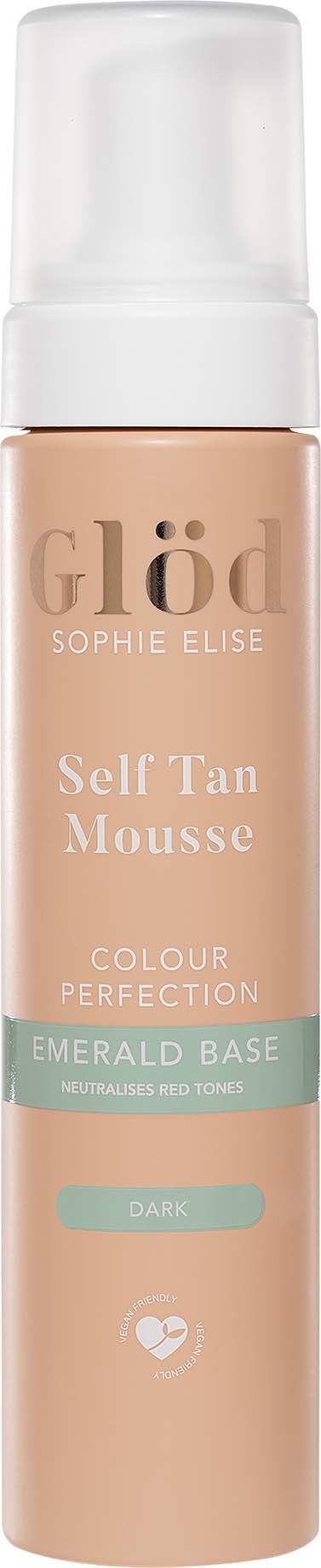 A spray bottle of self-tan mousse in a small beige container with a white pump and cap.