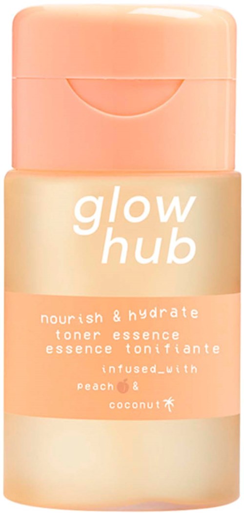 En liten flaske merket 'glow hub' med duft av fersken og kokos, ment for å nære og hydrere huden.