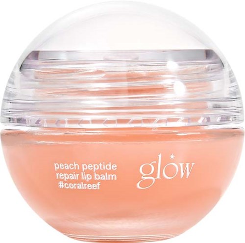 Okrągły słoik z różowym balsamem do ust, oznaczony 'peach peptide repair lip balm glow' i 'coralreef.'