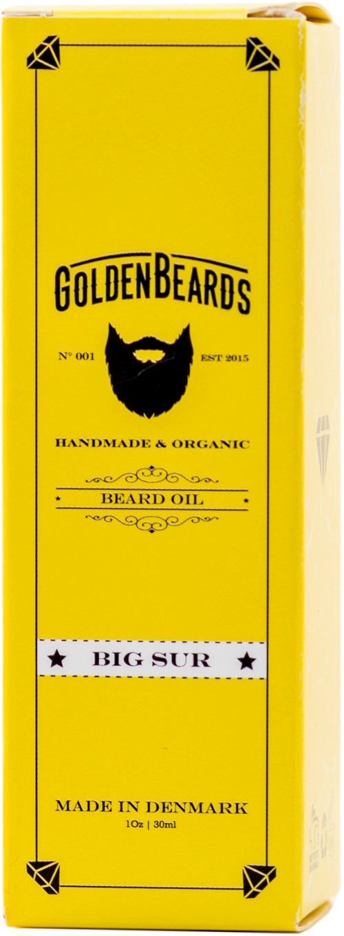 En gul låda med 'Golden Beards'-logotypen med skägg och mustasch, märkt 'Handmade & Organic Heared Oil,' med 'Big Sur' och 'Made in Denmark'-text.
