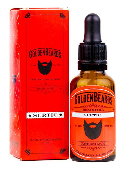 A small bottle of beard oil with a dropper next to a red box, labeled 'Golden Beards' and 'Beard Oil, Surti.'