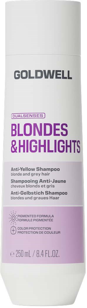 En vit flaska med Goldwell Blonde & Highlights anti-gul schampo med lila och svart etikett.