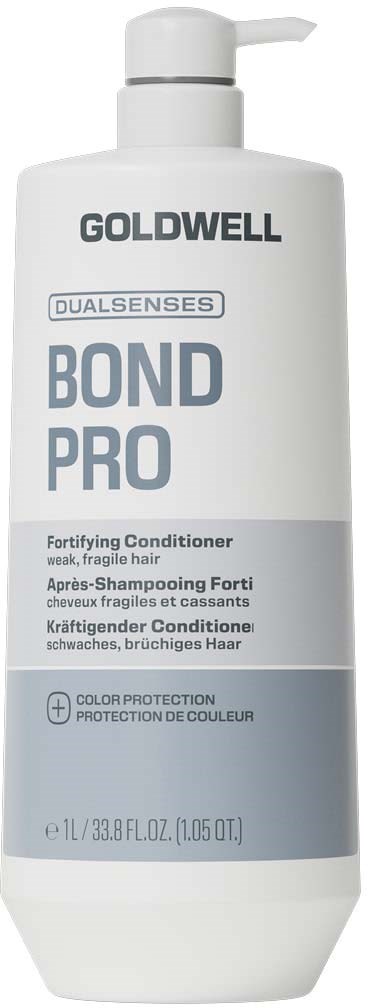 En vit flaska med Goldwell Bond Pro stärkande balsam med pump.