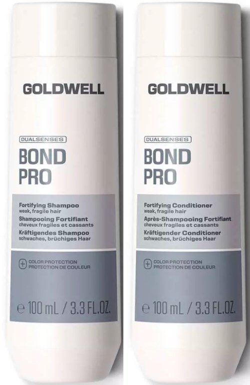 Två vita flaskor av Goldwell Bond Pro schampo och balsam. Schampo till vänster, balsam till höger, båda 100 ml.
