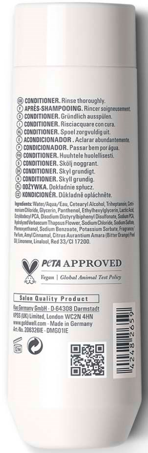 Baksidan av en vit balsamflaska med produktinformation, ingredienser och certifieringslogotyper.