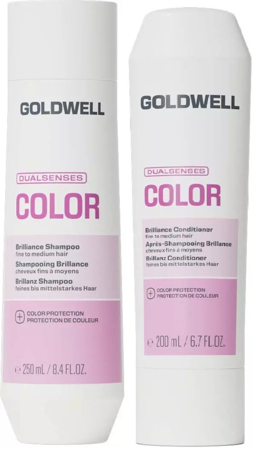 Två vita flaskor av Goldwell Dualsenses Color hårprodukter med rosa etiketter, en för schampo, en för balsam.