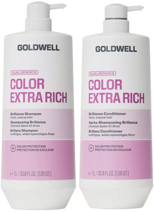 Två vita flaskor med Goldwell hårprodukter, ett schampo och ett balsam, med rosa och lila etiketter.