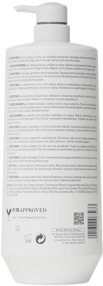 Bakvy av en vit flaska med pump, fylld med en hudvårds- eller kosmetikprodukt, med många textetiketter.