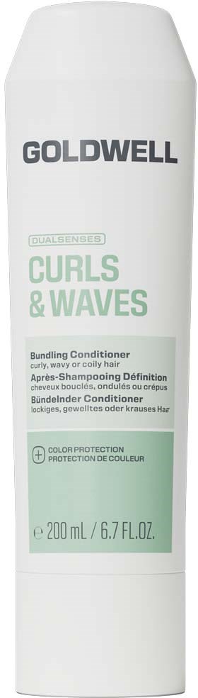 En vit flaska med Goldwell Curls & Waves balsam med gröna detaljer och produktinformation på etiketten.