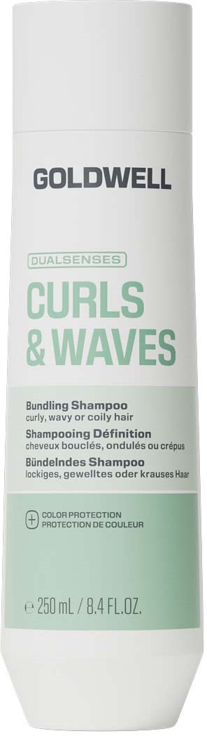 En vit flaska av Goldwell Curls & Waves schampo med etikett som betonar färgbevarande för lockigt hår.