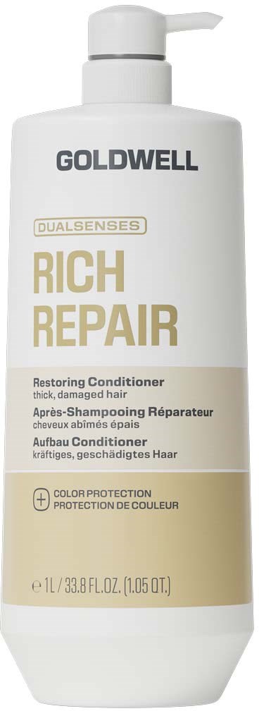 En vit flaska med Goldwell Rich Repair återställande balsam med pump.