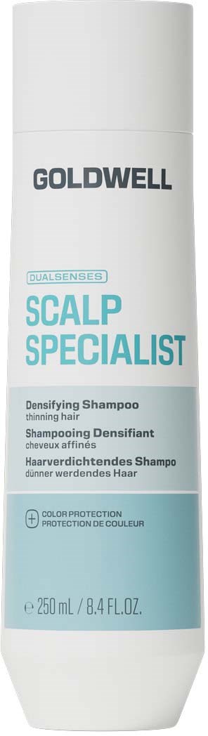 En vit flaska från Goldwell Scalp Specialist schampo med blå och svart text.