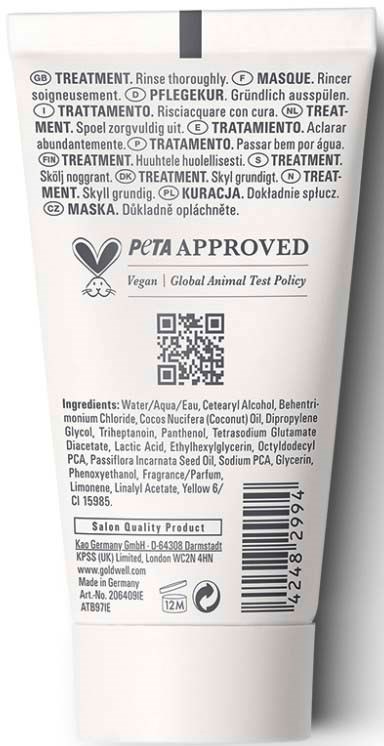 Rückseite einer Hautpflegecreme mit Inhaltsstoffen, Produktdetails und PETA Vegan-Logo.