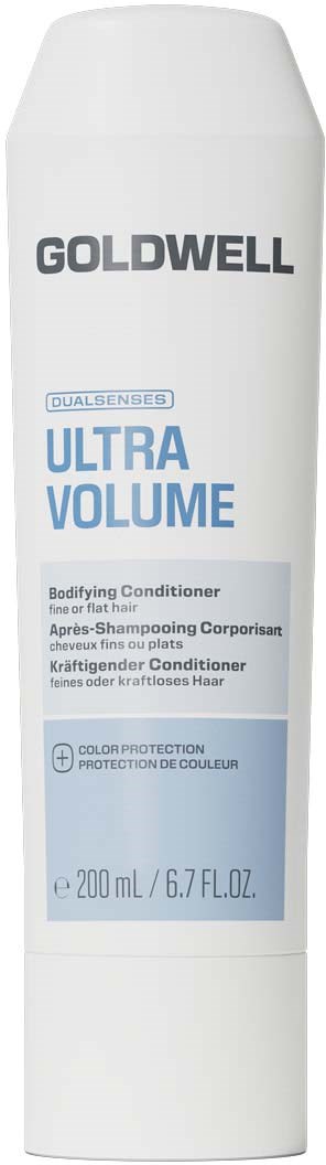 Vit flaska med Goldwell Ultra Volume balsam med blå etikett, som visar produktnamn och storlek.