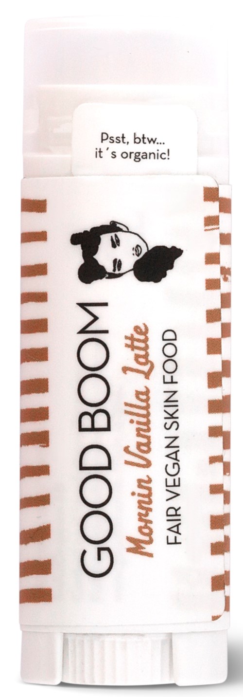 Ett labbrör med en etikett som säger "GOOD BOOM" och en tecknad hund, främjar vegansk hudvård.