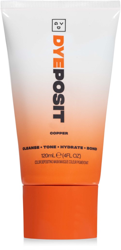 Een cosmetische tube met oranje en wit, gelabeld 'DYE POST' en 'Copper'. Het bevordert reinigen, toniseren, hydrateren en binden.
