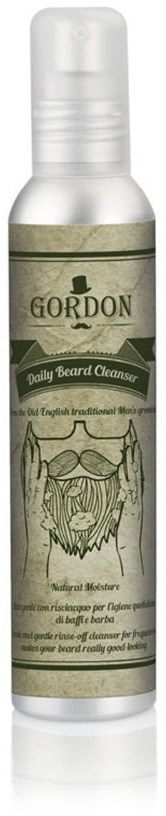 Biała butelka z zieloną etykietą z napisem 'Gordon Daily Beard Cleanser' i rysunkiem brody.