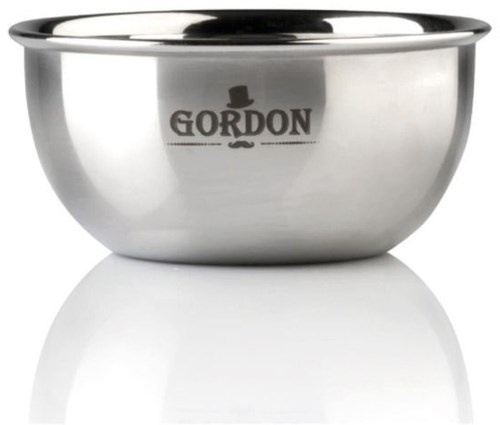 En glänsande metallskål med en logo som säger 'Gordon' och en hög hatt. Den ser ren och ny ut.
