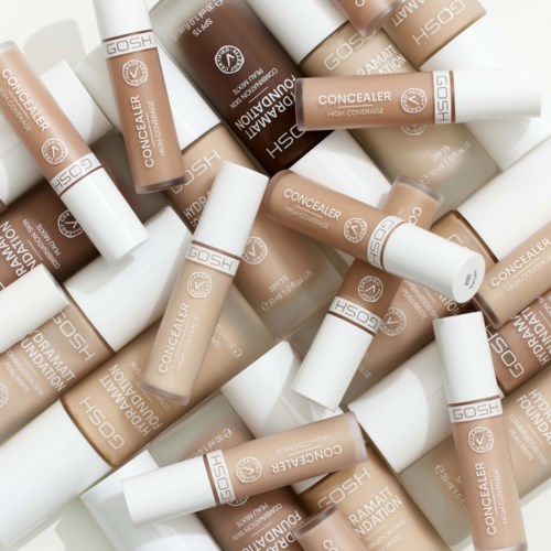 Useita GOSH-peitevoideputkiloita eri beige-sävyissä, satunnaisesti hajallaan.