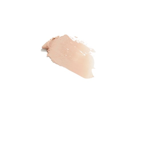 A streak of beige makeup or cream with a smooth, creamy texture on a white background.