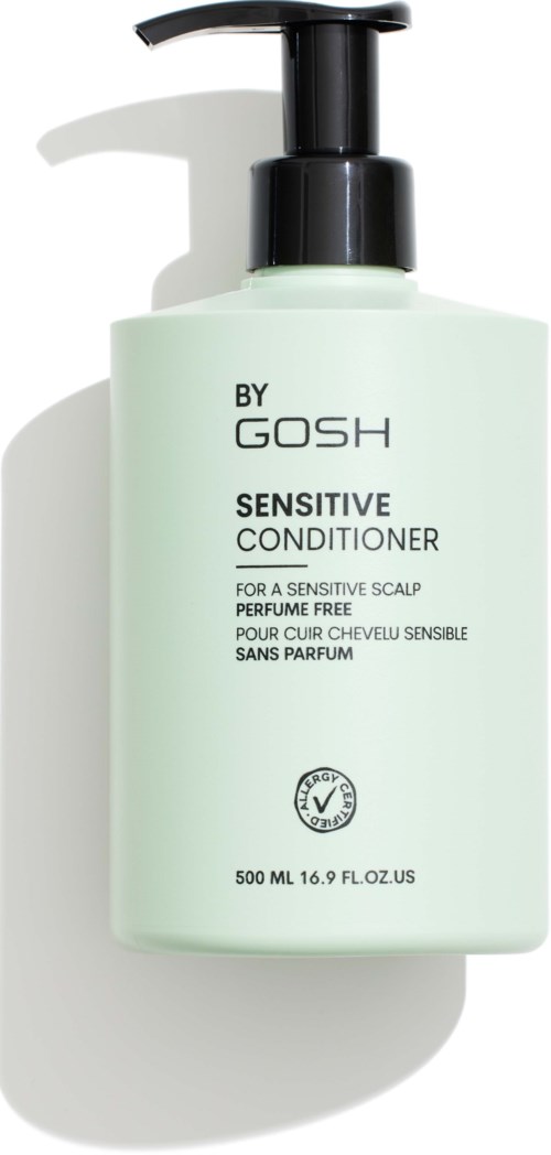 Vaaleanvihreä pullo mustalla pumpulla, merkinnällä 'By Gosh Sensitive Conditioner' herkälle päänahalle, 500 ml.