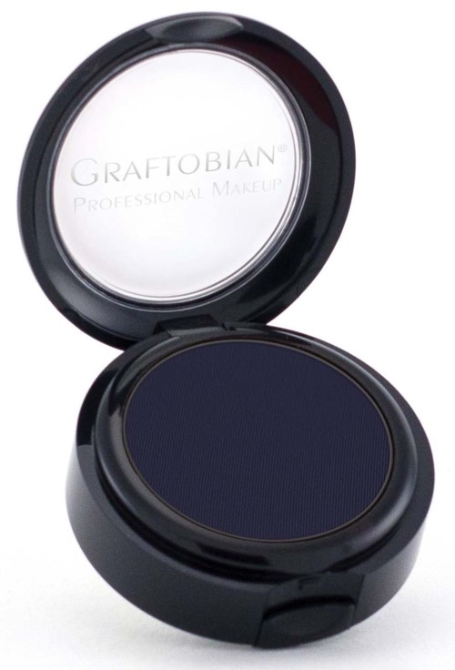 A round black container with navy blue makeup pressed inside and a mirror on the inside of the lid.
