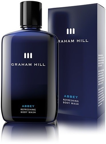 En mørk blå flaske og eske for Graham Hill Abbey Refreshing Body Wash. Flasken har en svart kork og enkel hvit tekst.