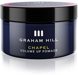En mörkblå burk med Graham Hill Chapel Volume Up Pomade, svart lock och vit text på etiketten.