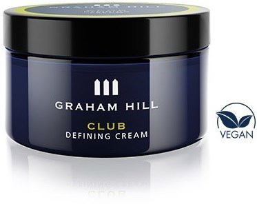 En bøtte Graham Hill Club Defining Cream, mørk blå med sort låg, vegansk hudplejeprodukt.