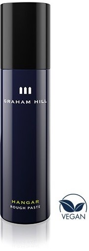En svart och blå tub märkt Graham Hill Hangar Rough Paste, med en vegansk logga på sidan.